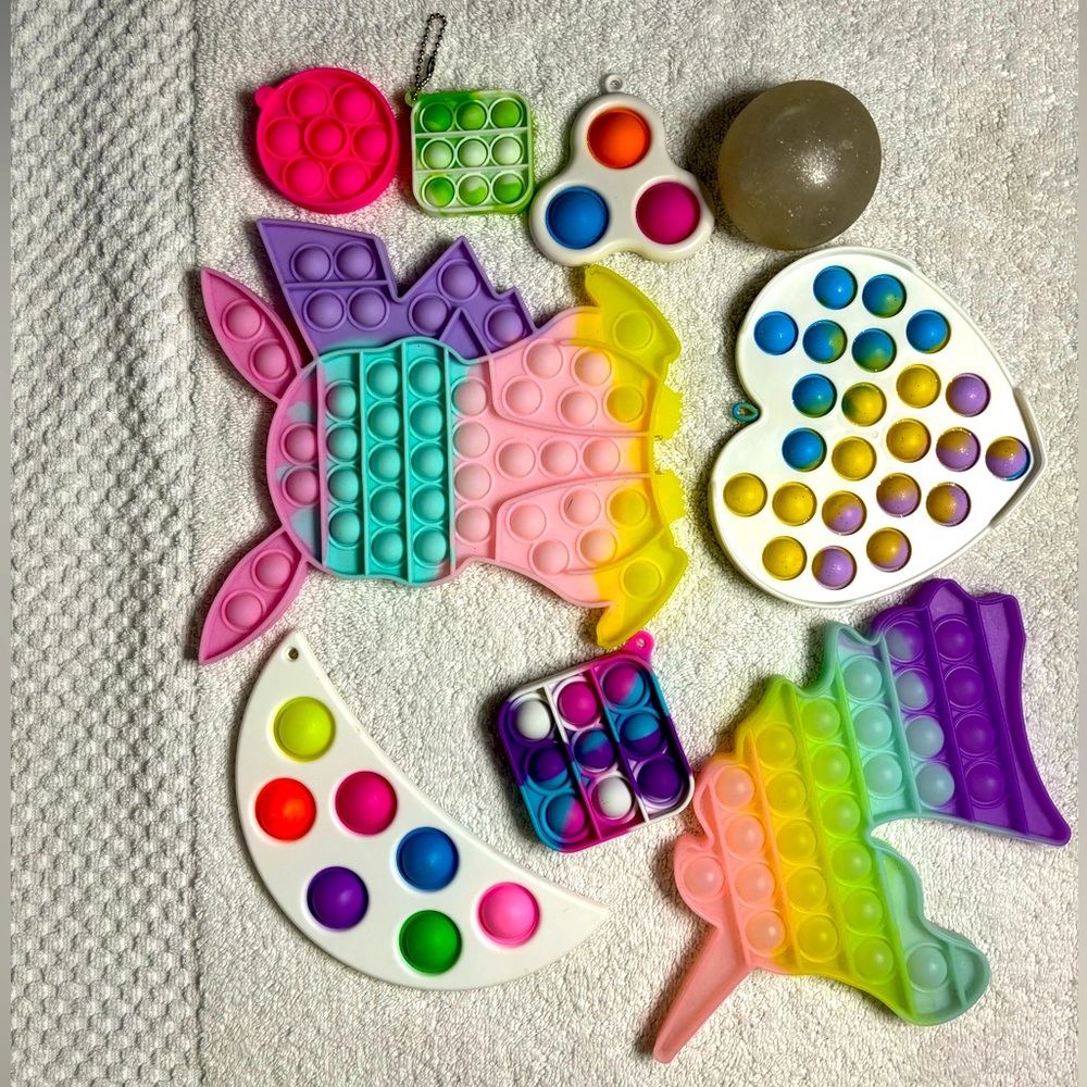 Huge Pack of Dimples and Pop-Its with an added squishy ball!